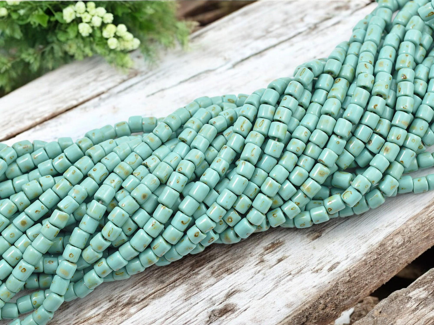 6/0 Aged Green Turquoise Picasso Tube Beads (20" Strand)