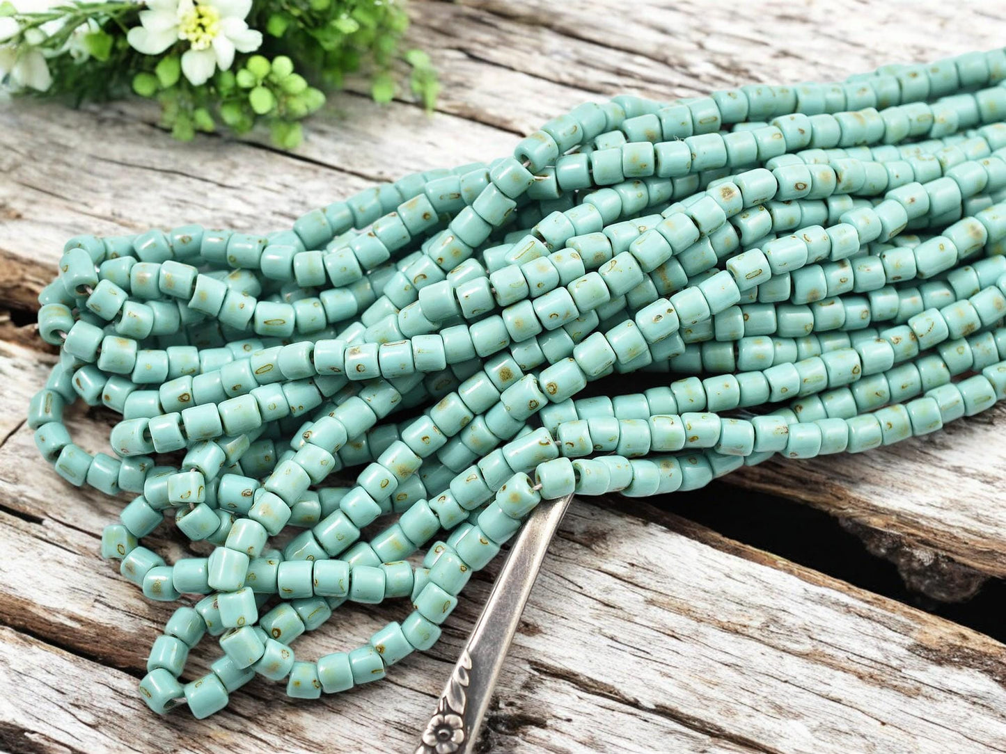 6/0 Aged Green Turquoise Picasso Tube Beads (20" Strand)