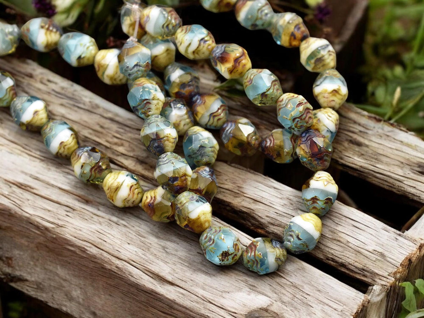 *15* 6x8mm Blended Aqua Topaz & White Picasso Oval Cathedral Beads