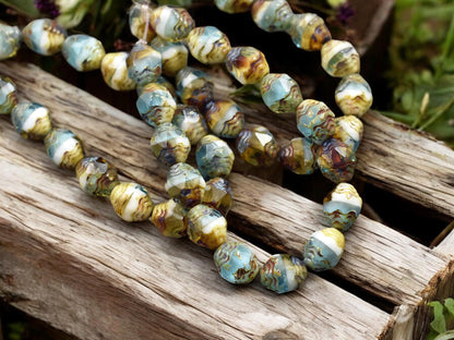 *15* 6x8mm Blended Aqua Topaz & White Picasso Oval Cathedral Beads